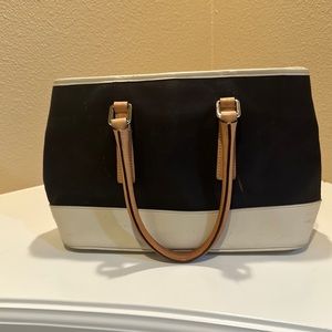 Coach bag black on outside- inside is pink